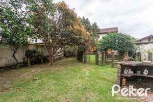 Casa em Condomínio à venda com 216m², 2 dormitórios, 2 suítes, 2 vagas, no bairro Terra Ville em PORTO ALEGRE