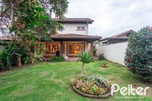 Casa em Condomínio à venda com 216m², 2 dormitórios, 2 suítes, 2 vagas, no bairro Terra Ville em PORTO ALEGRE