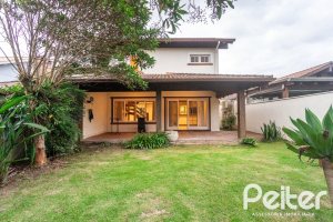 Casa em Condomínio à venda com 216m², 2 dormitórios, 2 suítes, 2 vagas, no bairro Terra Ville em PORTO ALEGRE