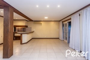 Casa em Condomínio à venda com 216m², 2 dormitórios, 2 suítes, 2 vagas, no bairro Terra Ville em PORTO ALEGRE