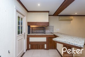 Casa em Condomínio à venda com 216m², 2 dormitórios, 2 suítes, 2 vagas, no bairro Terra Ville em PORTO ALEGRE