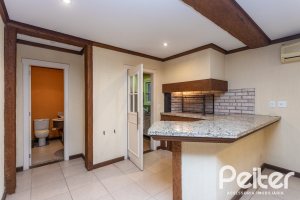 Casa em Condomínio à venda com 216m², 2 dormitórios, 2 suítes, 2 vagas, no bairro Terra Ville em PORTO ALEGRE