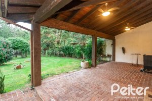 Casa em Condomínio à venda com 216m², 2 dormitórios, 2 suítes, 2 vagas, no bairro Terra Ville em PORTO ALEGRE