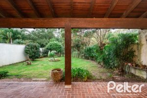 Casa em Condomínio à venda com 216m², 2 dormitórios, 2 suítes, 2 vagas, no bairro Terra Ville em PORTO ALEGRE