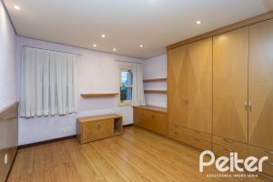 Casa em Condomínio à venda com 216m², 2 dormitórios, 2 suítes, 2 vagas, no bairro Terra Ville em PORTO ALEGRE