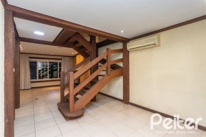 Casa em Condomínio à venda com 216m², 2 dormitórios, 2 suítes, 2 vagas, no bairro Terra Ville em PORTO ALEGRE