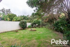 Casa em Condomínio à venda com 216m², 2 dormitórios, 2 suítes, 2 vagas, no bairro Terra Ville em PORTO ALEGRE
