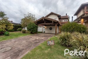 Casa em Condomínio à venda com 216m², 2 dormitórios, 2 suítes, 2 vagas, no bairro Terra Ville em PORTO ALEGRE