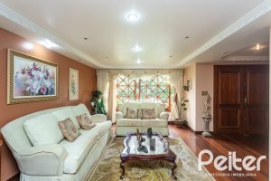 Casa à venda com 247m², 3 dormitórios, 3 suítes, 4 vagas, no bairro Ipanema em Porto Alegre