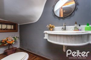 Casa à venda com 247m², 3 dormitórios, 3 suítes, 4 vagas, no bairro Ipanema em Porto Alegre