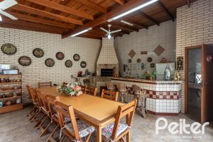 Casa à venda com 247m², 3 dormitórios, 3 suítes, 4 vagas, no bairro Ipanema em Porto Alegre