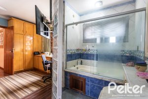 Casa à venda com 247m², 3 dormitórios, 3 suítes, 4 vagas, no bairro Ipanema em Porto Alegre