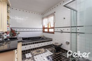Casa à venda com 247m², 3 dormitórios, 3 suítes, 4 vagas, no bairro Ipanema em Porto Alegre