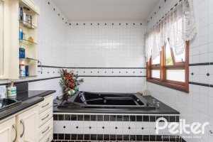 Casa à venda com 247m², 3 dormitórios, 3 suítes, 4 vagas, no bairro Ipanema em Porto Alegre