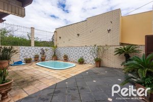 Casa à venda com 247m², 3 dormitórios, 3 suítes, 4 vagas, no bairro Ipanema em Porto Alegre