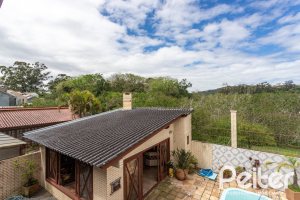 Casa à venda com 247m², 3 dormitórios, 3 suítes, 4 vagas, no bairro Ipanema em Porto Alegre