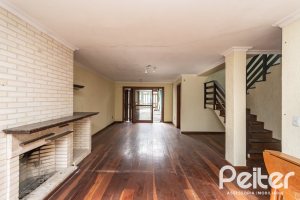 Casa à venda com 280m², 4 dormitórios, 1 suíte, 4 vagas, no bairro Ipanema em Porto Alegre