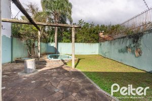 Casa à venda com 280m², 4 dormitórios, 1 suíte, 4 vagas, no bairro Ipanema em Porto Alegre