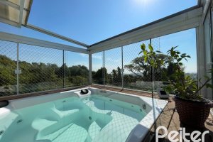 Casa em Condomínio à venda com 105m², 3 dormitórios, 1 suíte, 2 vagas, no bairro Tristeza em Porto Alegre