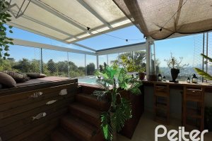 Casa em Condomínio à venda com 105m², 3 dormitórios, 1 suíte, 2 vagas, no bairro Tristeza em Porto Alegre