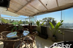 Casa em Condomínio à venda com 105m², 3 dormitórios, 1 suíte, 2 vagas, no bairro Tristeza em Porto Alegre