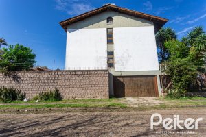 Casa à venda com 199m², 3 dormitórios, 1 suíte, 3 vagas, no bairro Ipanema em Porto Alegre