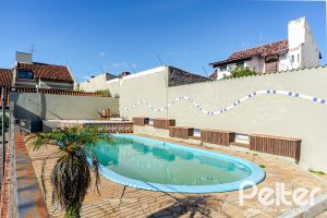 Casa em Condomínio à venda com 179m², 4 dormitórios, 1 suíte, 2 vagas, no bairro Cavalhada em Porto Alegre