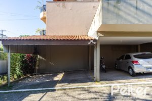 Casa em Condomínio à venda com 179m², 4 dormitórios, 1 suíte, 2 vagas, no bairro Cavalhada em Porto Alegre