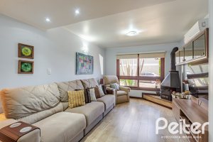 Casa em Condomínio à venda com 179m², 4 dormitórios, 1 suíte, 2 vagas, no bairro Cavalhada em Porto Alegre