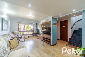 Casa em Condomínio à venda com 179m², 4 dormitórios, 1 suíte, 2 vagas, no bairro Cavalhada em Porto Alegre