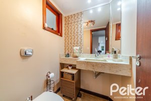 Casa em Condomínio à venda com 179m², 4 dormitórios, 1 suíte, 2 vagas, no bairro Cavalhada em Porto Alegre