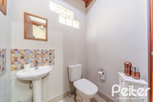 Casa em Condomínio à venda com 179m², 4 dormitórios, 1 suíte, 2 vagas, no bairro Cavalhada em Porto Alegre