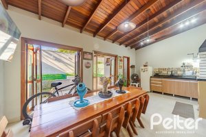 Casa em Condomínio à venda com 179m², 4 dormitórios, 1 suíte, 2 vagas, no bairro Cavalhada em Porto Alegre