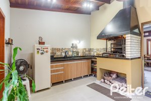 Casa em Condomínio à venda com 179m², 4 dormitórios, 1 suíte, 2 vagas, no bairro Cavalhada em Porto Alegre