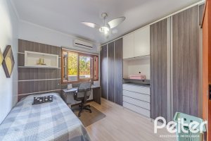 Casa em Condomínio à venda com 179m², 4 dormitórios, 1 suíte, 2 vagas, no bairro Cavalhada em Porto Alegre