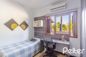 Casa em Condomínio à venda com 179m², 4 dormitórios, 1 suíte, 2 vagas, no bairro Cavalhada em Porto Alegre