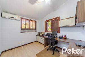 Casa em Condomínio à venda com 179m², 4 dormitórios, 1 suíte, 2 vagas, no bairro Cavalhada em Porto Alegre