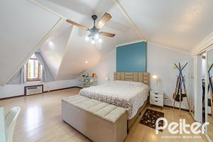 Casa em Condomínio à venda com 179m², 4 dormitórios, 1 suíte, 2 vagas, no bairro Cavalhada em Porto Alegre