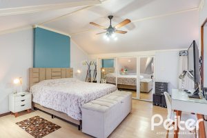 Casa em Condomínio à venda com 179m², 4 dormitórios, 1 suíte, 2 vagas, no bairro Cavalhada em Porto Alegre