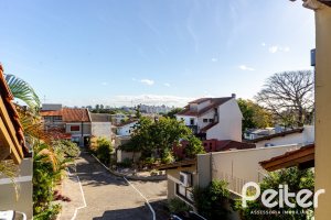 Casa em Condomínio à venda com 179m², 4 dormitórios, 1 suíte, 2 vagas, no bairro Cavalhada em Porto Alegre