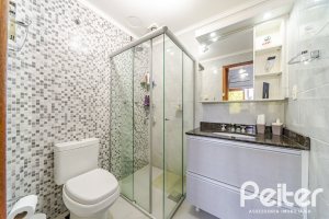 Casa em Condomínio à venda com 179m², 4 dormitórios, 1 suíte, 2 vagas, no bairro Cavalhada em Porto Alegre