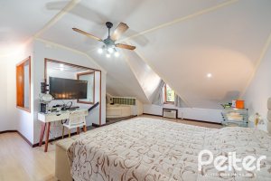 Casa em Condomínio à venda com 179m², 4 dormitórios, 1 suíte, 2 vagas, no bairro Cavalhada em Porto Alegre