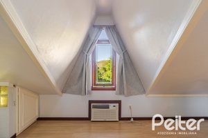 Casa em Condomínio à venda com 179m², 4 dormitórios, 1 suíte, 2 vagas, no bairro Cavalhada em Porto Alegre