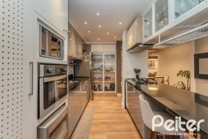 Casa em Condomínio à venda com 154m², 3 dormitórios, 1 suíte, 2 vagas, no bairro Tristeza em Porto Alegre