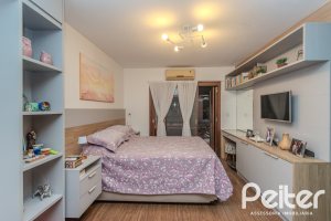 Casa em Condomínio à venda com 154m², 3 dormitórios, 1 suíte, 2 vagas, no bairro Tristeza em Porto Alegre