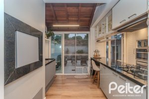 Casa em Condomínio à venda com 154m², 3 dormitórios, 1 suíte, 2 vagas, no bairro Tristeza em Porto Alegre
