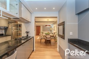 Casa em Condomínio à venda com 154m², 3 dormitórios, 1 suíte, 2 vagas, no bairro Tristeza em Porto Alegre