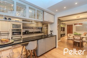 Casa em Condomínio à venda com 154m², 3 dormitórios, 1 suíte, 2 vagas, no bairro Tristeza em Porto Alegre