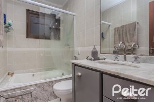 Casa em Condomínio à venda com 154m², 3 dormitórios, 1 suíte, 2 vagas, no bairro Tristeza em Porto Alegre
