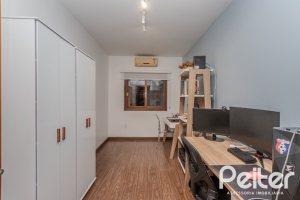 Casa em Condomínio à venda com 154m², 3 dormitórios, 1 suíte, 2 vagas, no bairro Tristeza em Porto Alegre
